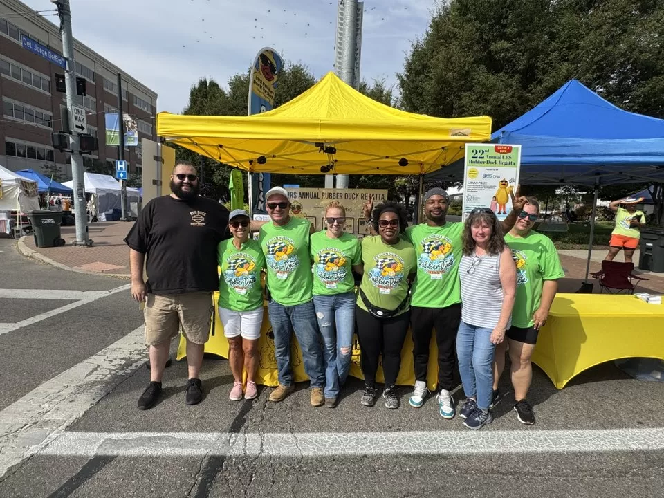 Rubber Duck Regatta volunteers at booth