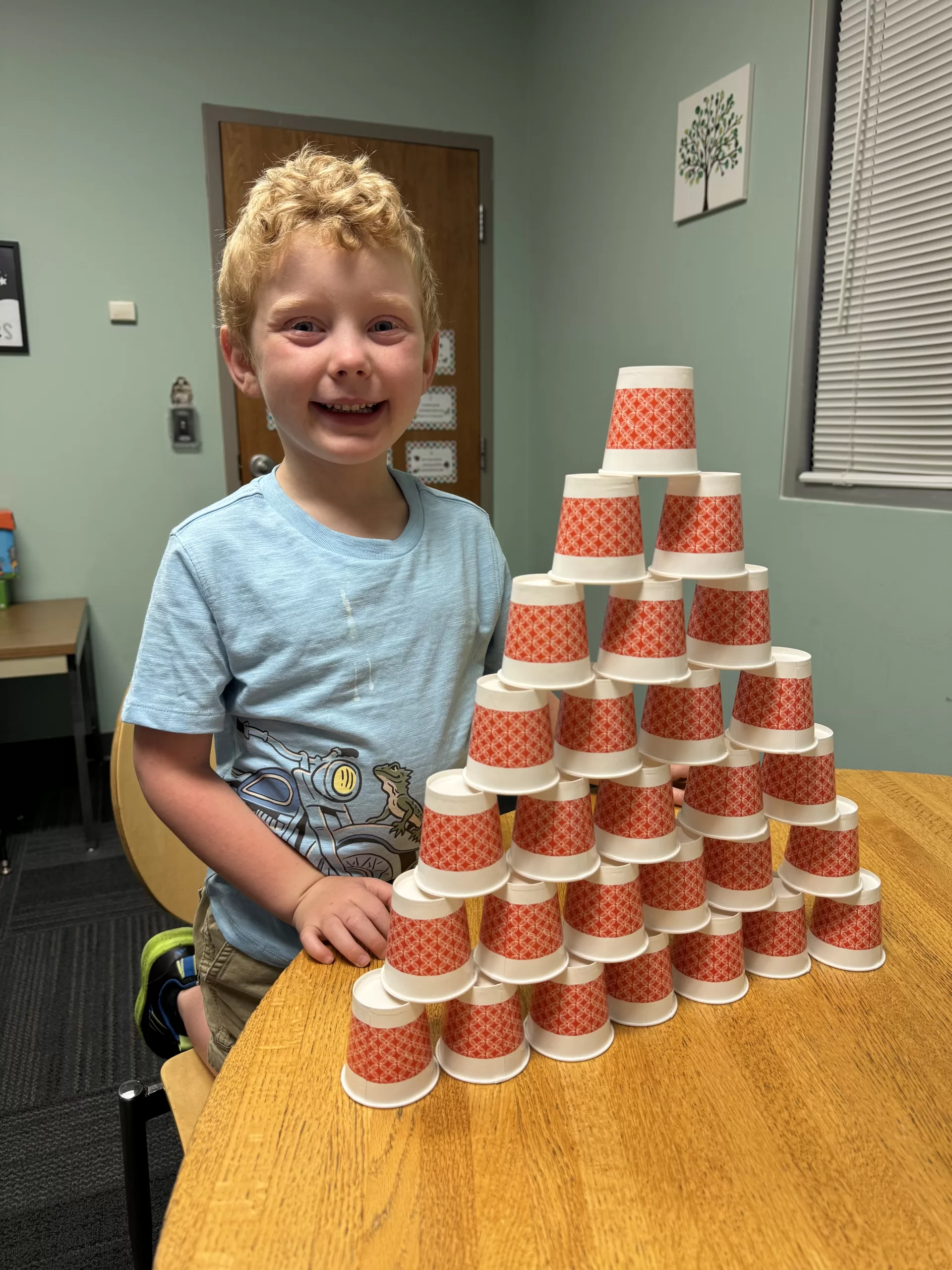 Silvan with his cup castle celebrating his L sound progress