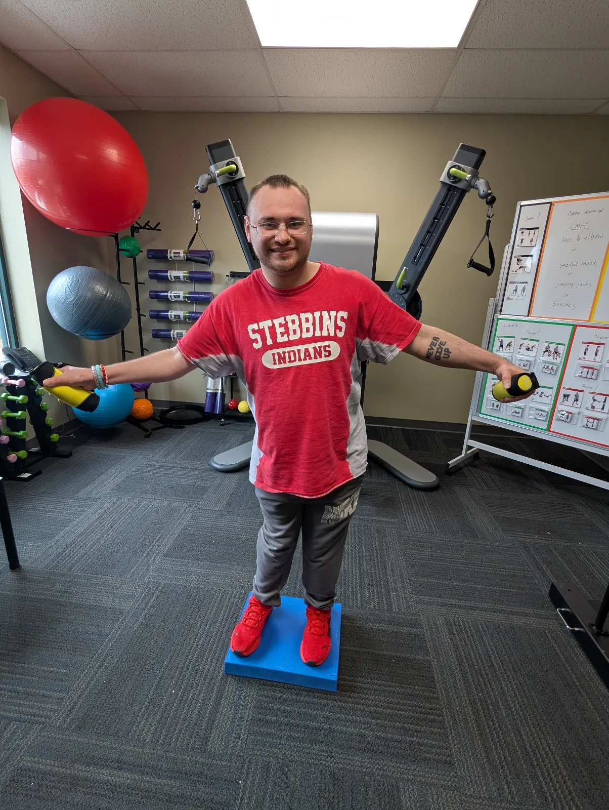 Adult patient doing balance exercises during physical therapy